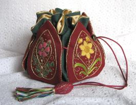 A stumpwork embroidery 'Petal Bag'. The design is from the book 'Elizabethan Needlework Accessories'