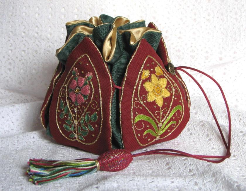A stumpwork embroidery 'petal bag'