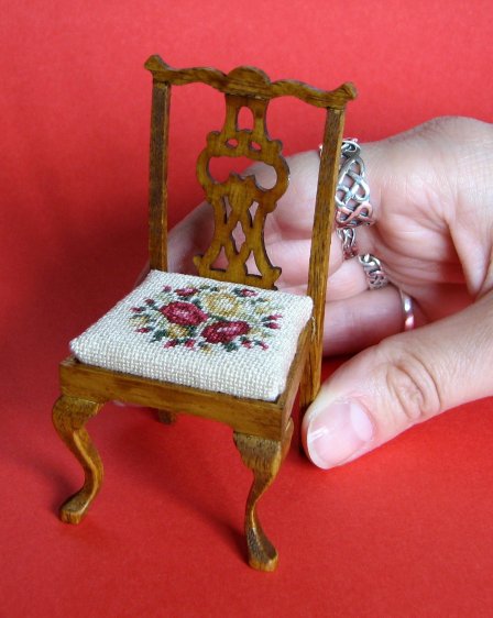The 'Summer Roses' design on a doll's house scale dining chair. The chair measures just 3 1/2 inches high.