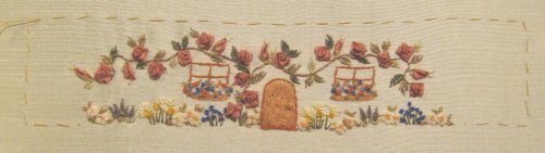 The house wall design for the 'Rose Cottage' pincushion by Carolyn Pearce