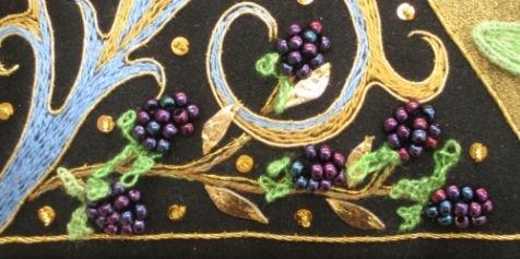 Close-up of stumpwork blackberries on the 'Illuminated Floral' panel, by Alison Cole